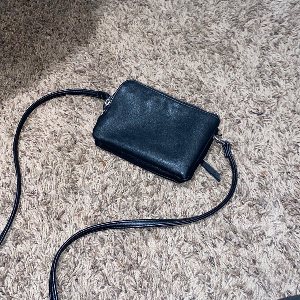 Over shoulder purse with built in card holders.